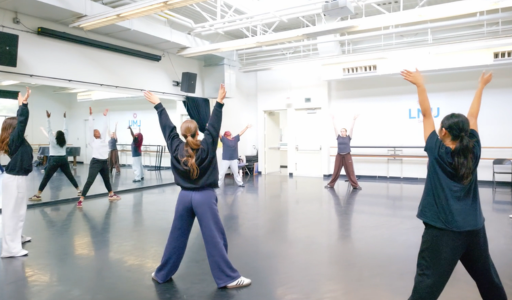 Pre-college students dance in an LMU dance studio